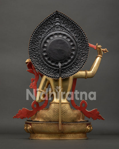 Back view of handcrafted Manjushri Statue with engraved halo and fine Newari craftsmanship