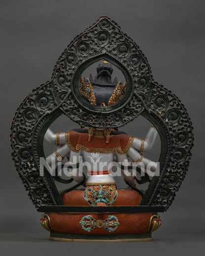back view of handcrafted namgyalma statue featuring floral halo and detailed copper artistry