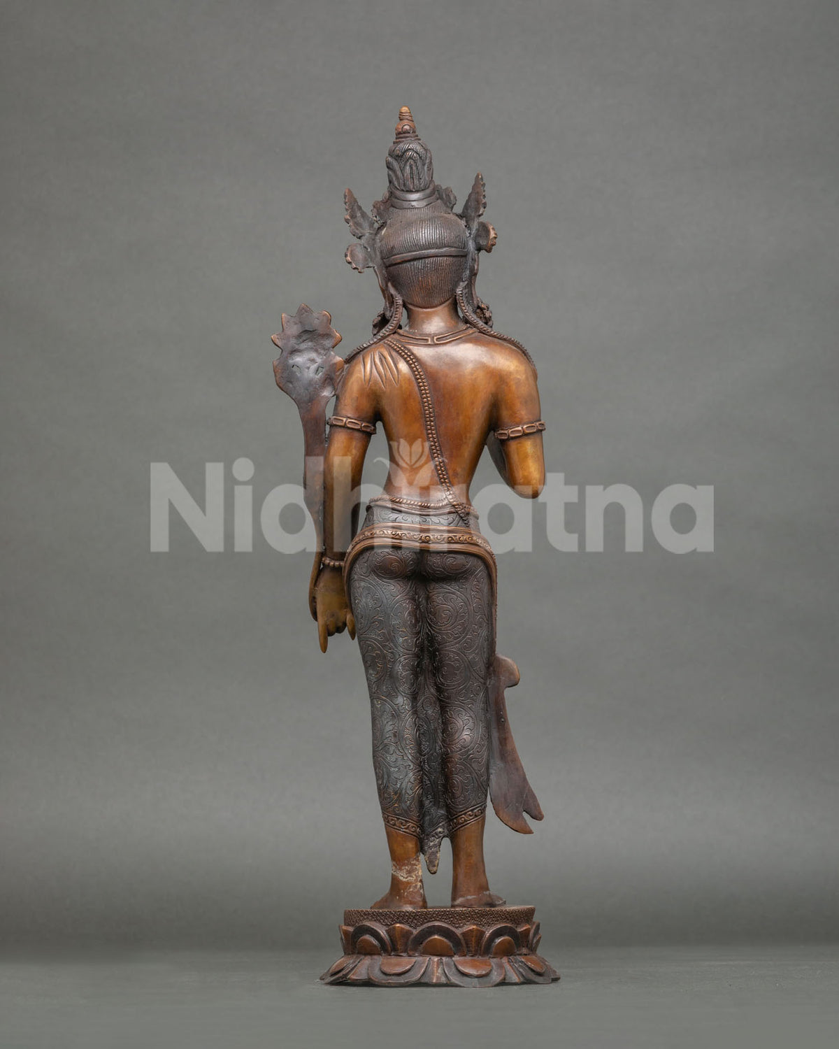 Back view of handcrafted oxidized copper Lokeshvara statue showing lost wax casting finish, Nepal
