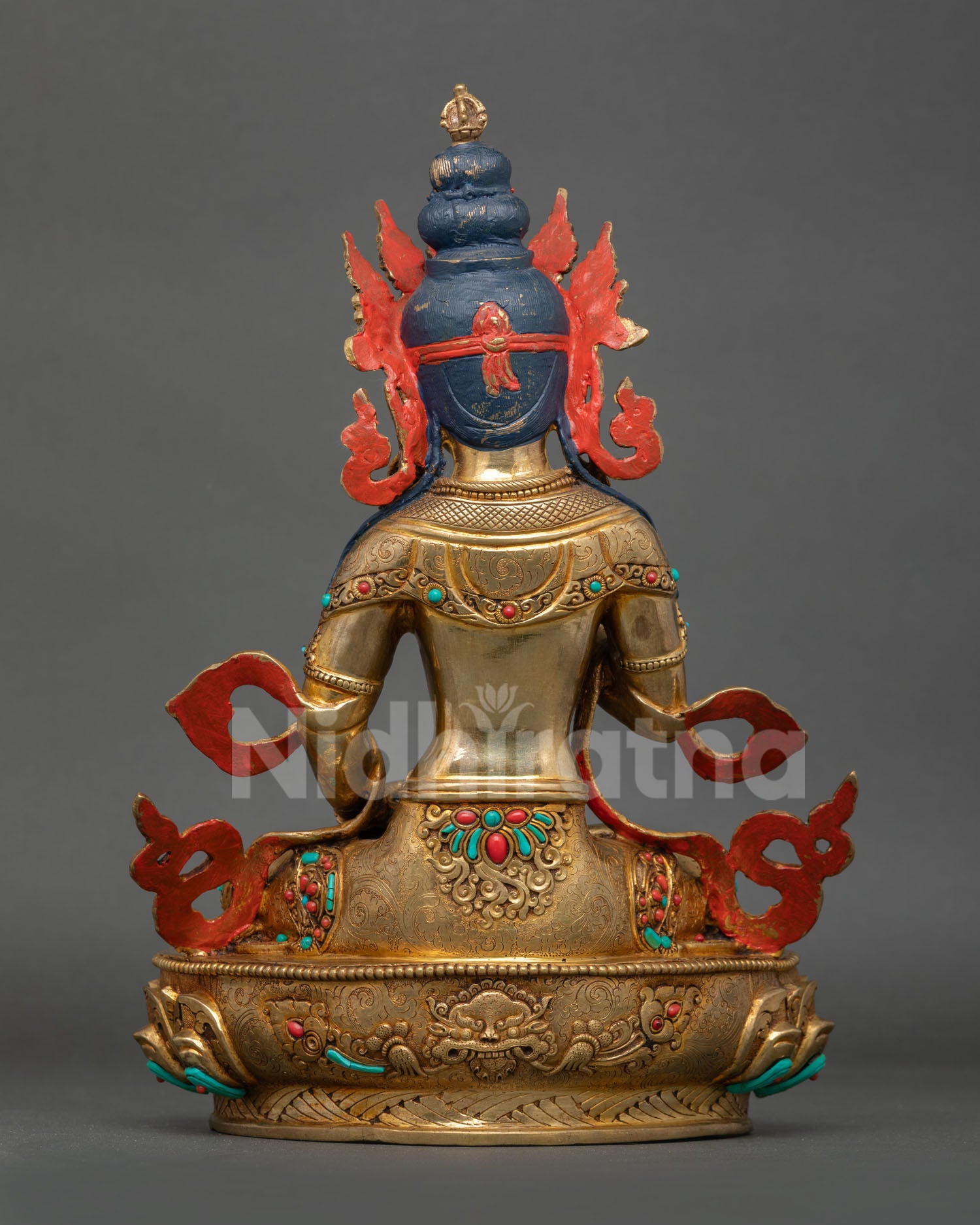 Back view of handcrafted Vajrasattva statue with intricate Nepalese craftsmanship and sacred ornaments