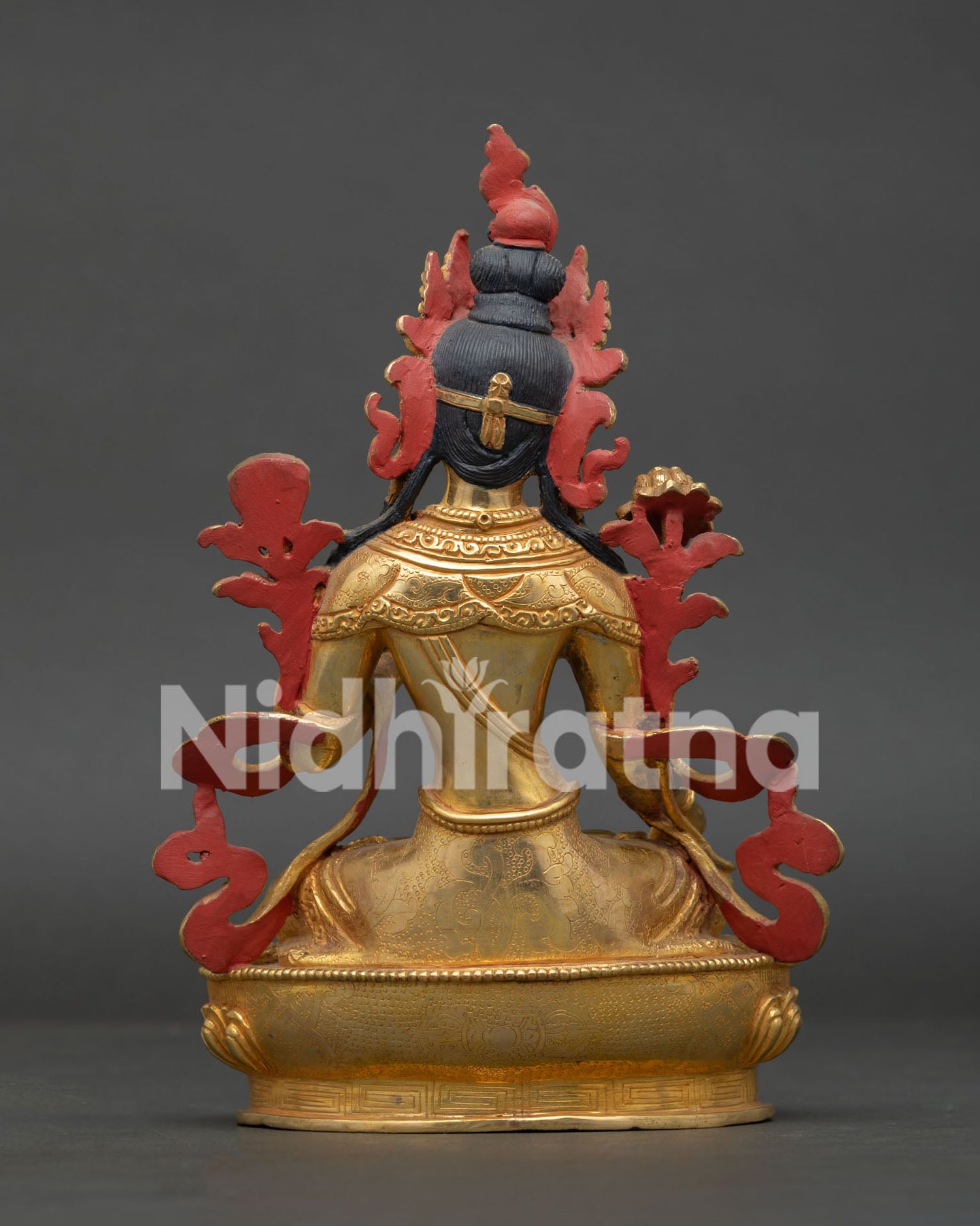 Back view of handcrafted White Tara statue by Newari artisans from Patan Nepal.