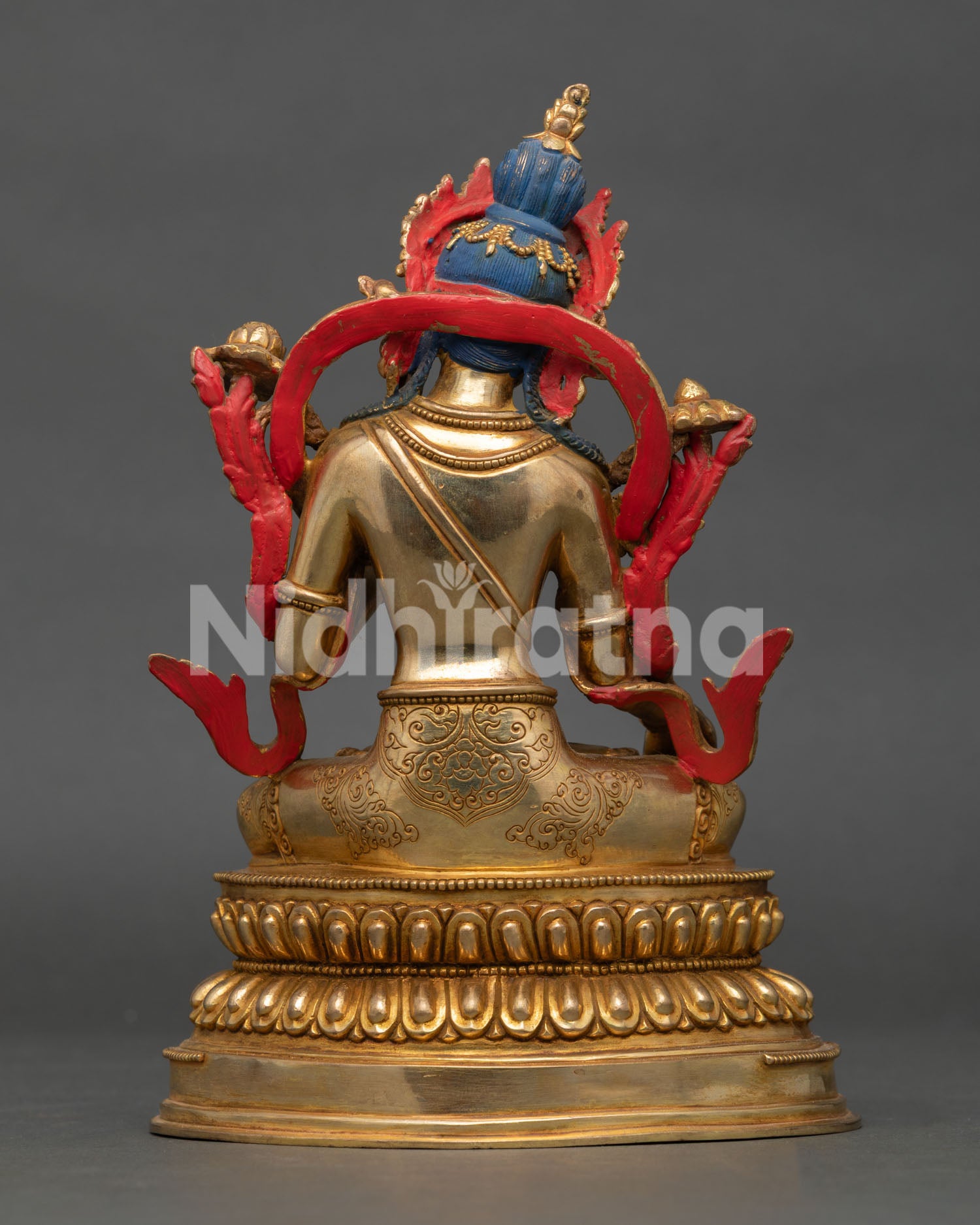 Back view of handcrafted White Tara statue with gold gilded copper design and Himalayan Buddhist artistry