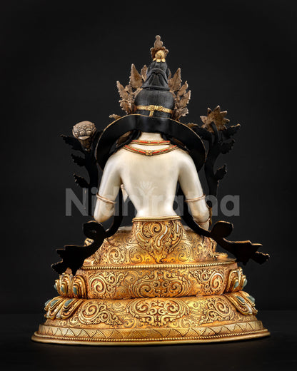 Back view of handcrafted White Tara statue with intricate Nepalese craftsmanship and gold details