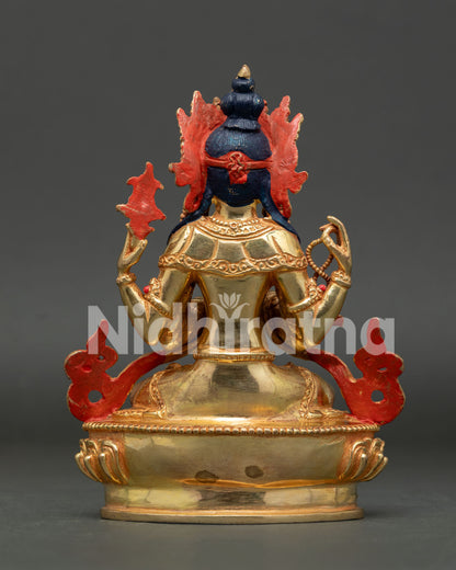 Back view of handmade Chenrezig Buddhist statue, created using the lost wax casting method