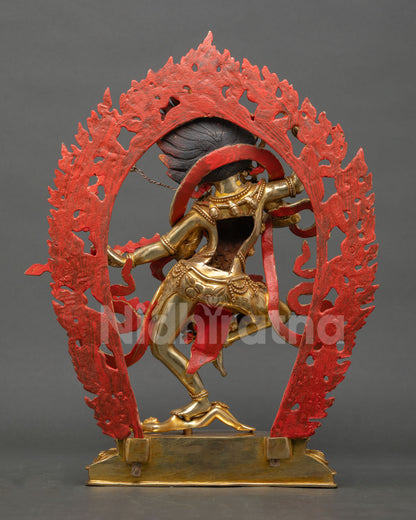 Back view of handmade Kurukulla statue from Nepal with copper body gold gilded finish and traditional Newari lost wax casting craftsmanship