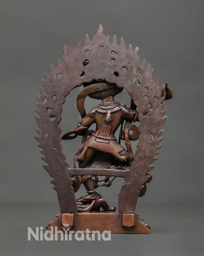 Back view of handmade Newari copper sculpture from Patan Nepal with intricate carving oxidized finish and spiritual Buddhist details