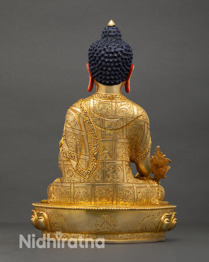 Back view of handmade Newari Medicine Buddha statue from Patan Nepal with intricate copper carving gold finish and spiritual altar decor details