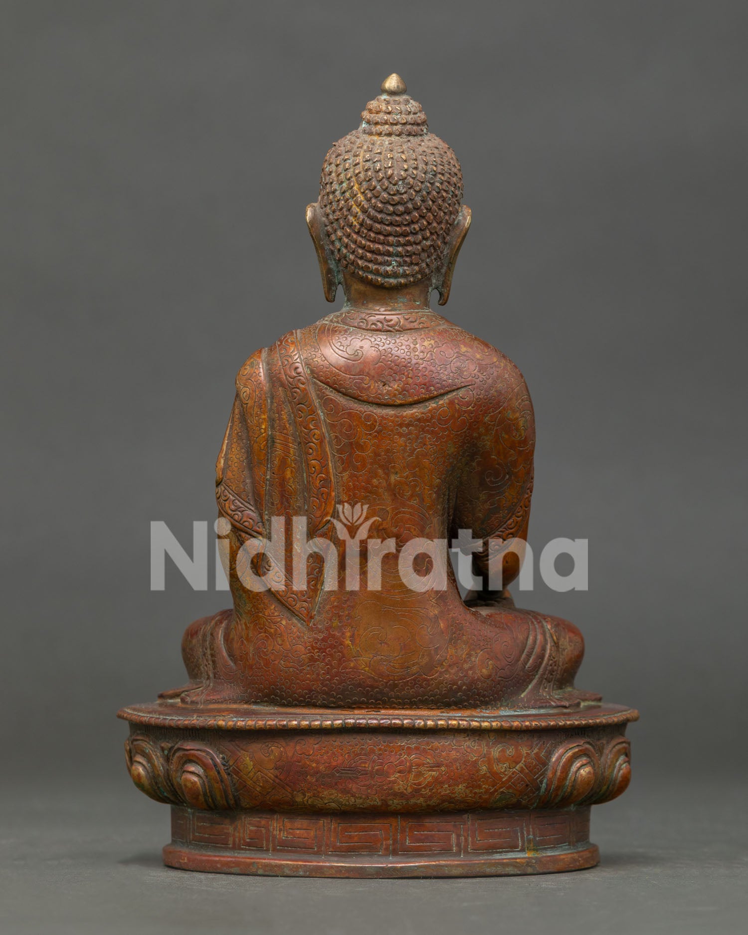 Back View of Handmade Shakyamuni Buddha Statue with a rich oxidized antique finish.
