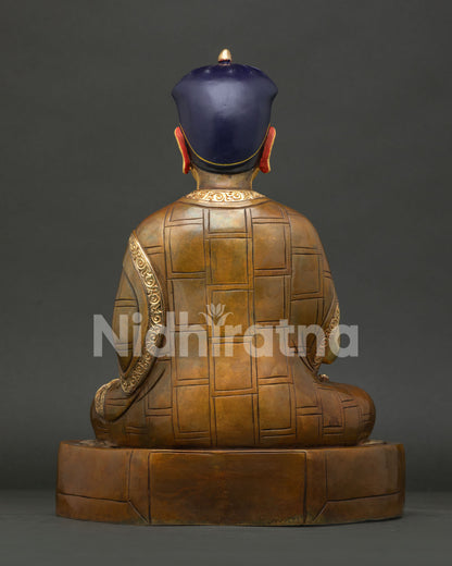 Back View of Handmade Tsangpa Gyare Statue with Oxidized Copper and Gold Gilded Finish