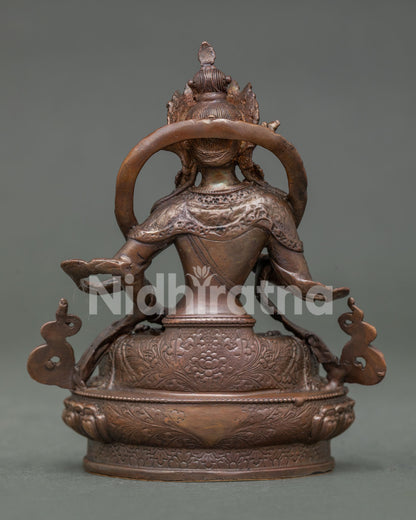 Back View of Handmade Vajrasattva Statue on Lotus Pedestal in Oxidized Copper from Nepal