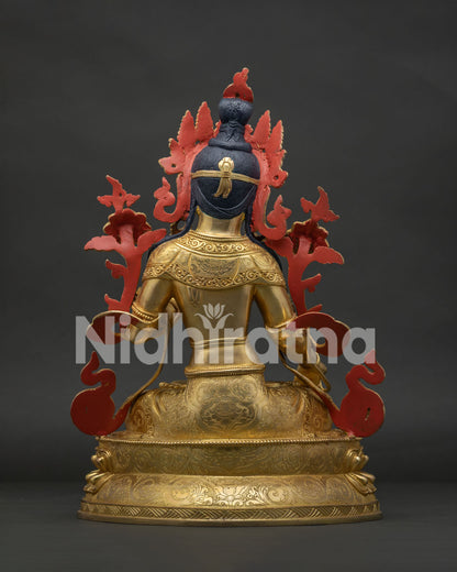 Back view of handmade White Tara Statue with detailed craftsmanship and lotus base