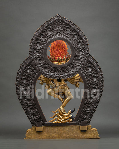 Back view of Hevajra statue with dark patina halo and engraved gold base, Nepali Buddhist art