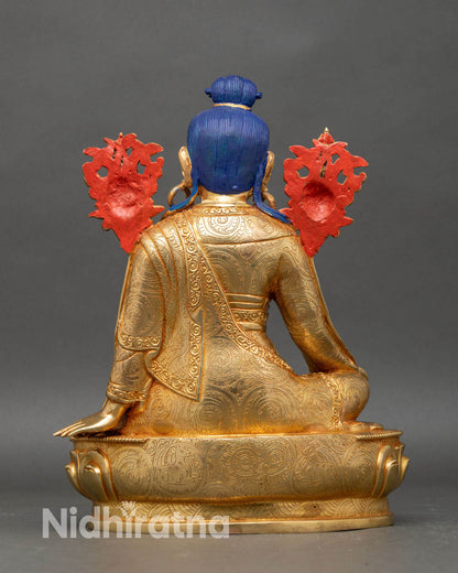 Back view of Jigme Lingpa statue showing detailed robes and artisan craftsmanship
