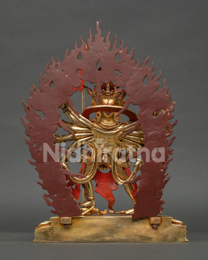 back view of kalachakra statue with detailed halo and traditional carvings