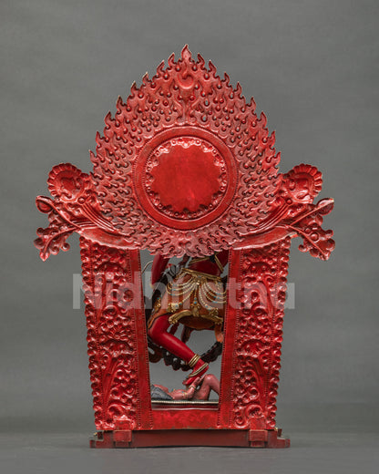 Back view of Kurukulla statue with flaming halo and floral gateway, handcrafted Nepalese Buddhist art