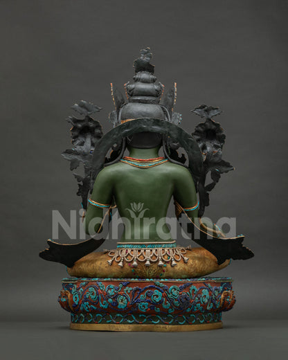 Back view of large copper Green Tara statue highlighting fine repoussé work and authentic Nepali art.
