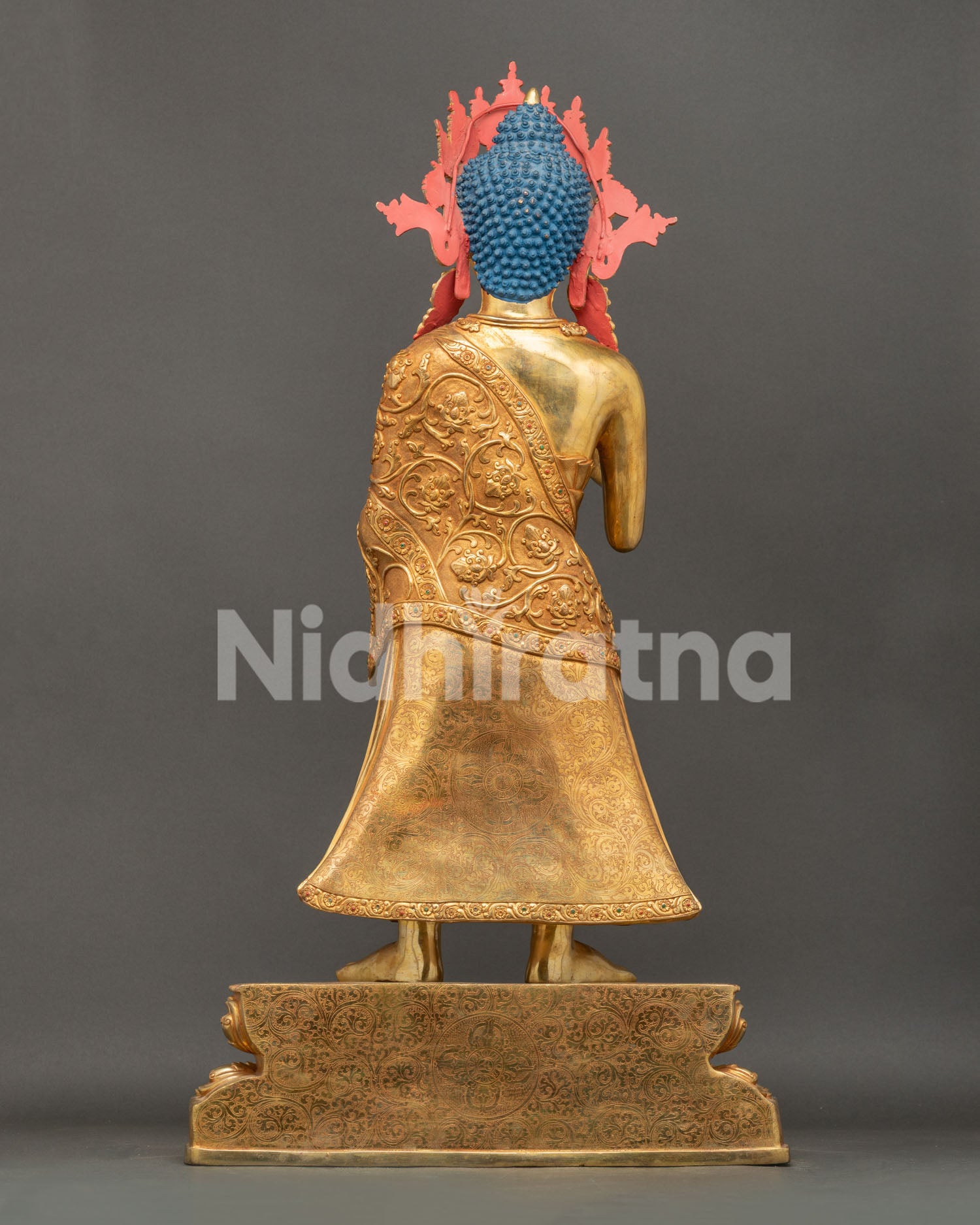 Back view of large Dipankara Buddha statue showing handcrafted details and gold gilded copper finish