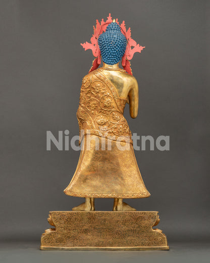 Back view of large Dipankara Buddha statue showing handcrafted details and gold gilded copper finish