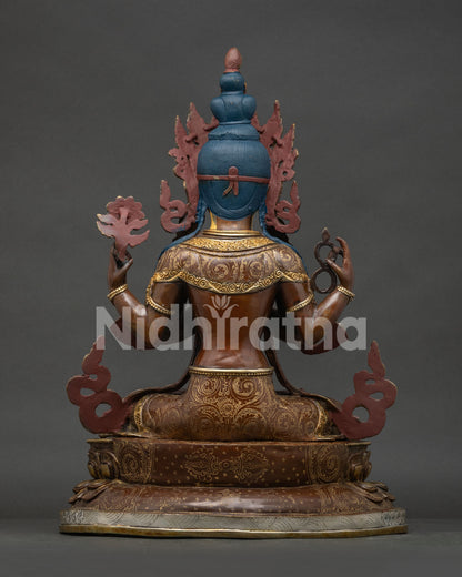 Back view of lost-wax cast copper Chenrezig statue showing traditional Newari metalwork and back carvings.