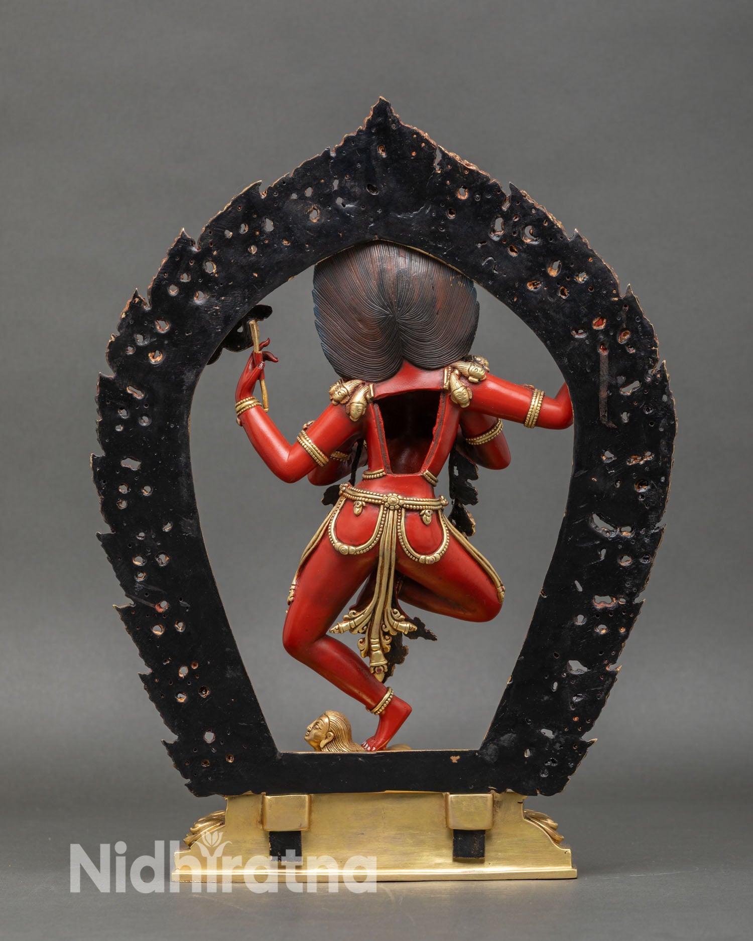 Back view of Maha Vajravarahi statue showing prabhavali halo, detailed ornaments and nepalese craftsmanship