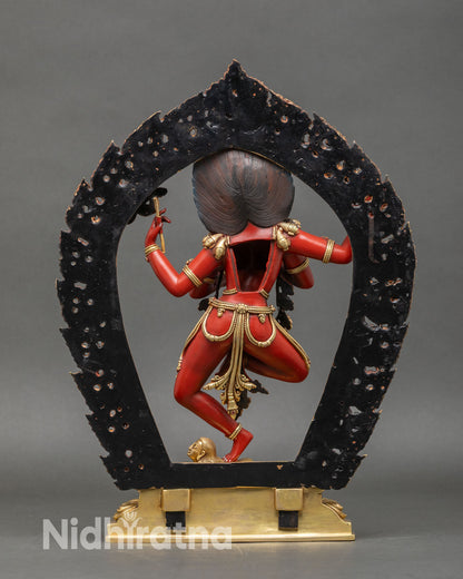 Back view of Maha Vajravarahi statue showing prabhavali halo, detailed ornaments and nepalese craftsmanship