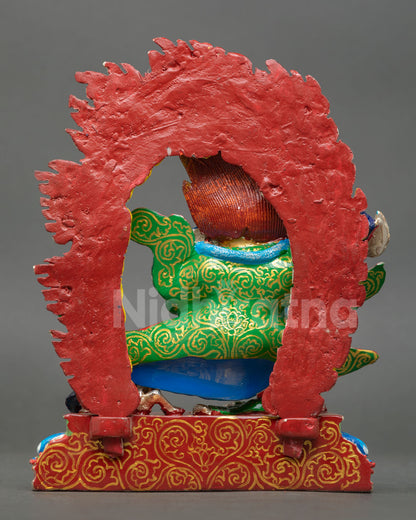 back view of mahakala bernagchen statue with detailed copper carving and halo