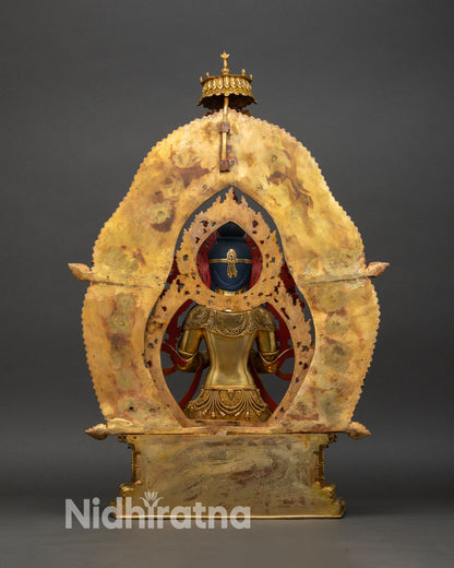 back view of maitreya buddha statue, flame halo with celestial carvings