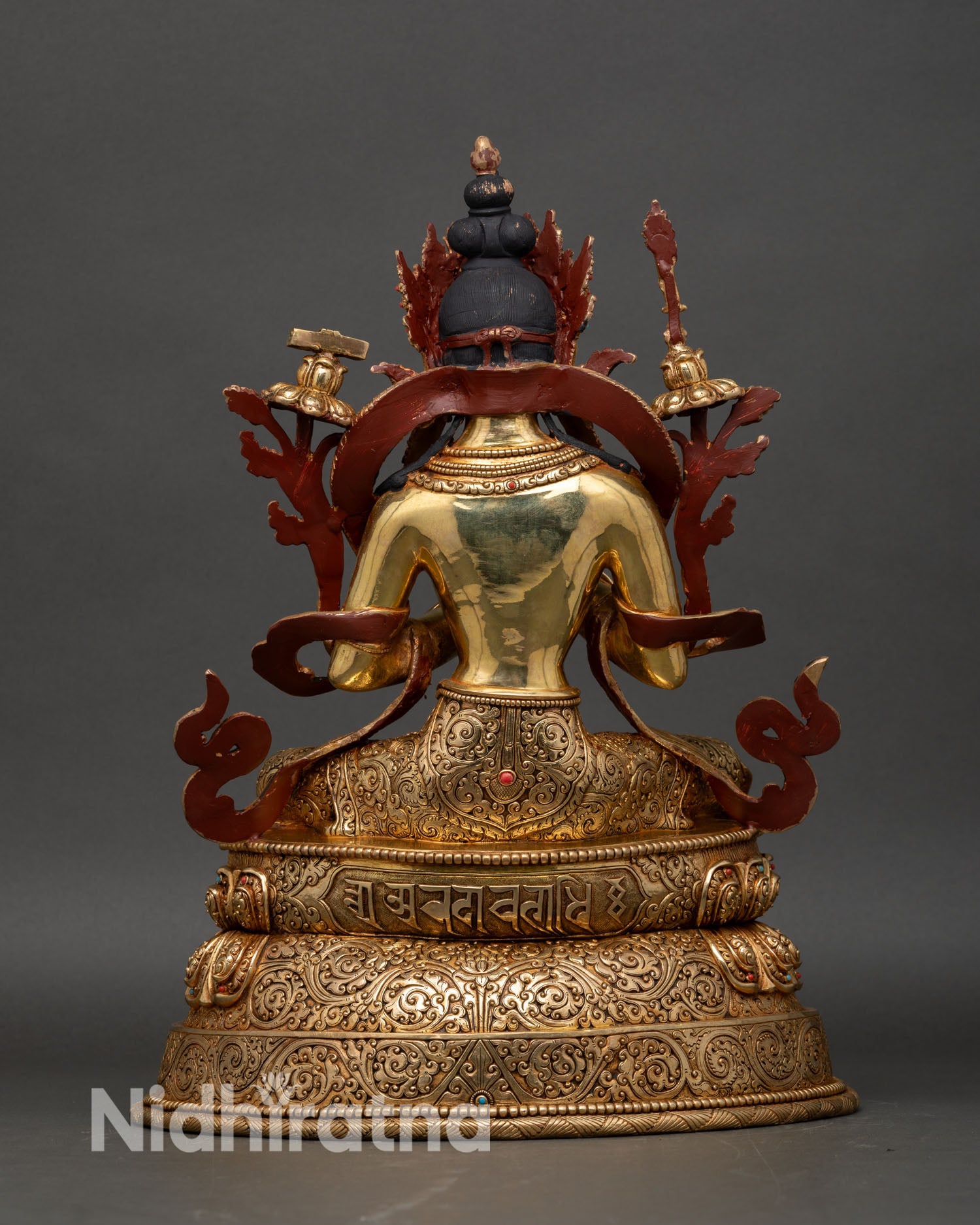 Back view of Manjushri Bodhisattva seated on double-layered lotus throne in Dharmachakra Mudra, Nepalese lost-wax Buddhist art statue