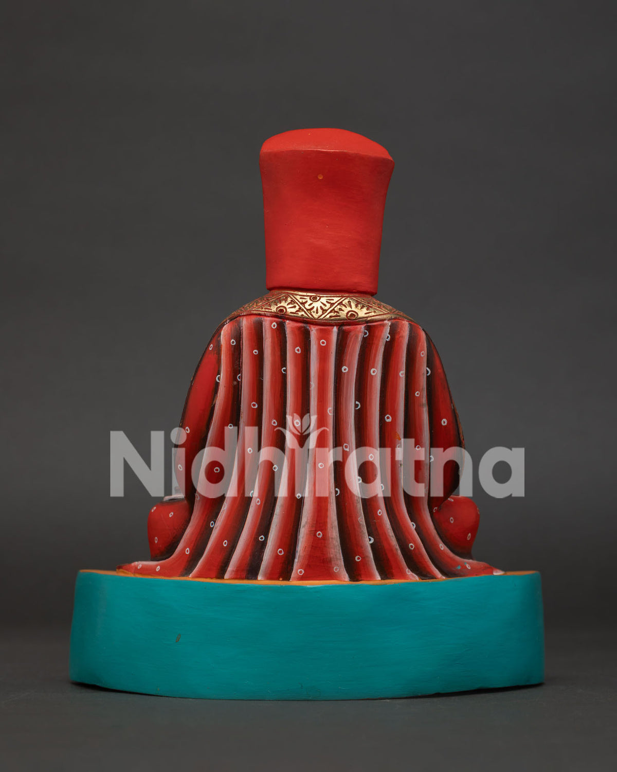 Back view of Marpa Lotsawa statue showing hand-carved robes, handcrafted copper art from Nepal