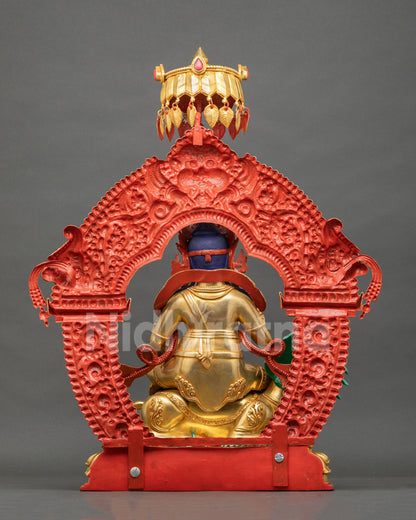 Back view of Namtoshe statue from Nepal with red-painted arched halo, parasol and fire-gilded copper body