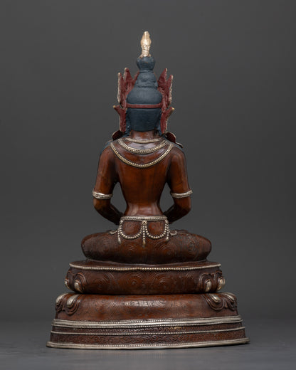 Back view of Nepalese Amitayus statue with oxidized silver plated finish and intricate details