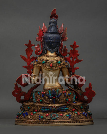 Back view of Nepalese Green Tara statue with copper gold gilded filigree artwork