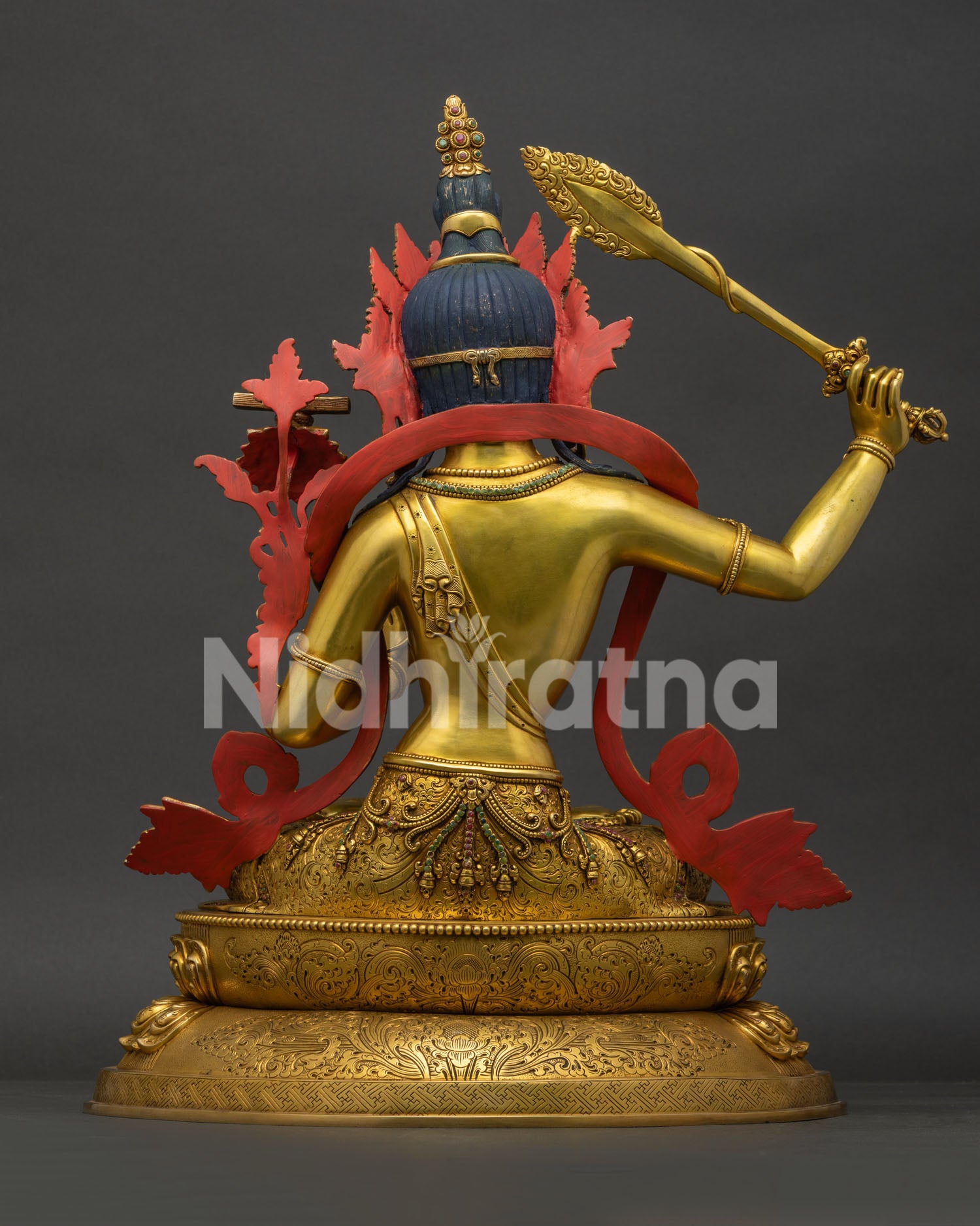 Back view of Newari handcrafted copper Manjushri lotus throne statue