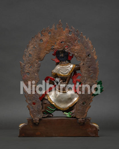 Back view of oxidized copper Tsheringma statue showing halo & lotus base