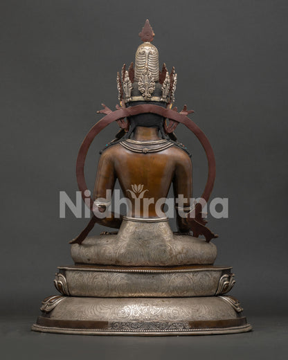 Back view of Oxidized Medicine Buddha Statue with detailed silver plated craftsmanship