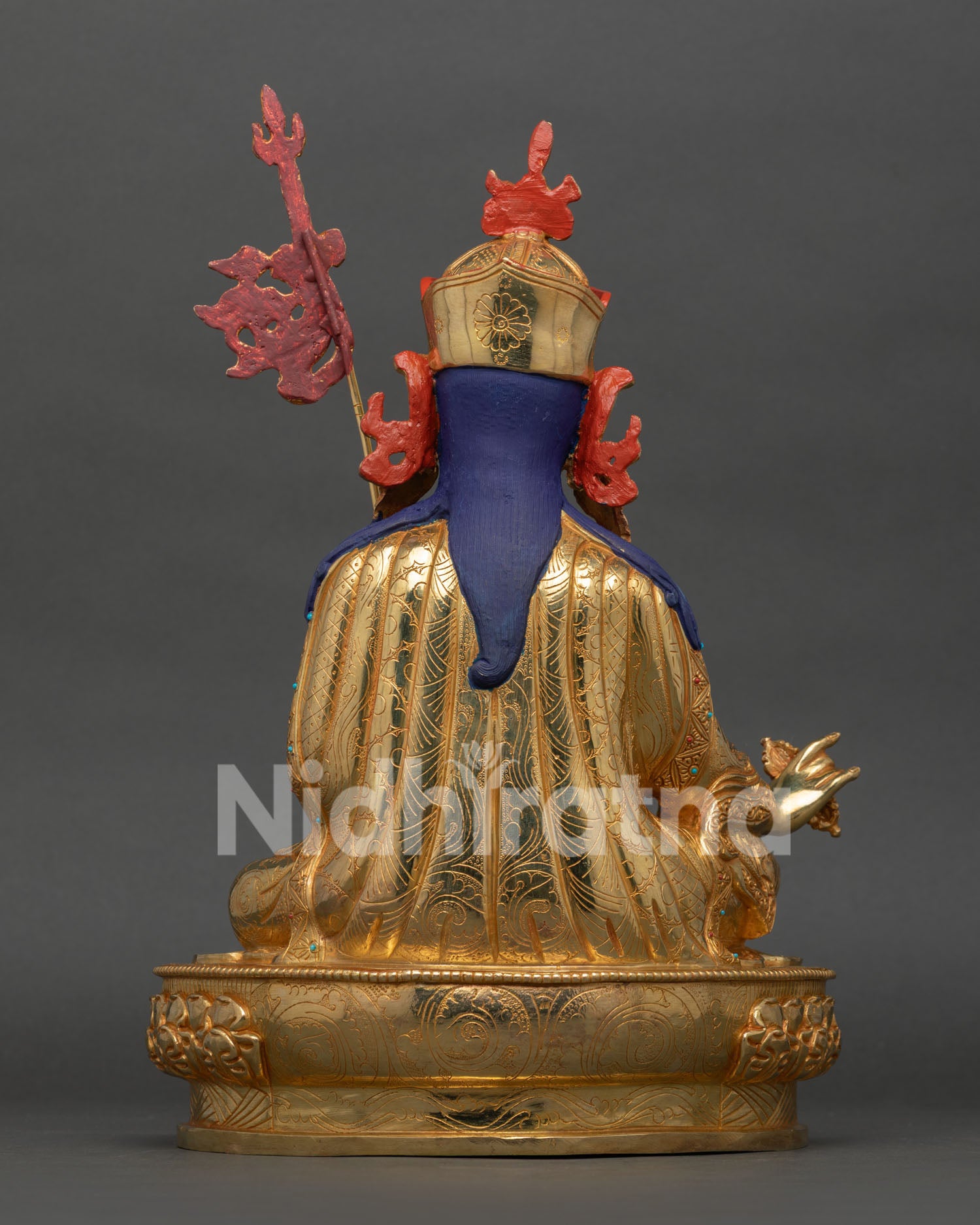 back view of padmasambhava statue featuring intricate carvings and newari craftsmanship nepal
