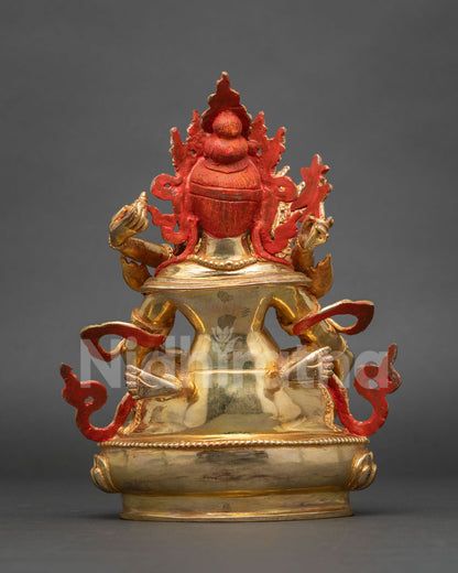Back view of Red Dzambhala Yab-Yum statue showing painted halo, copper body and gilded base