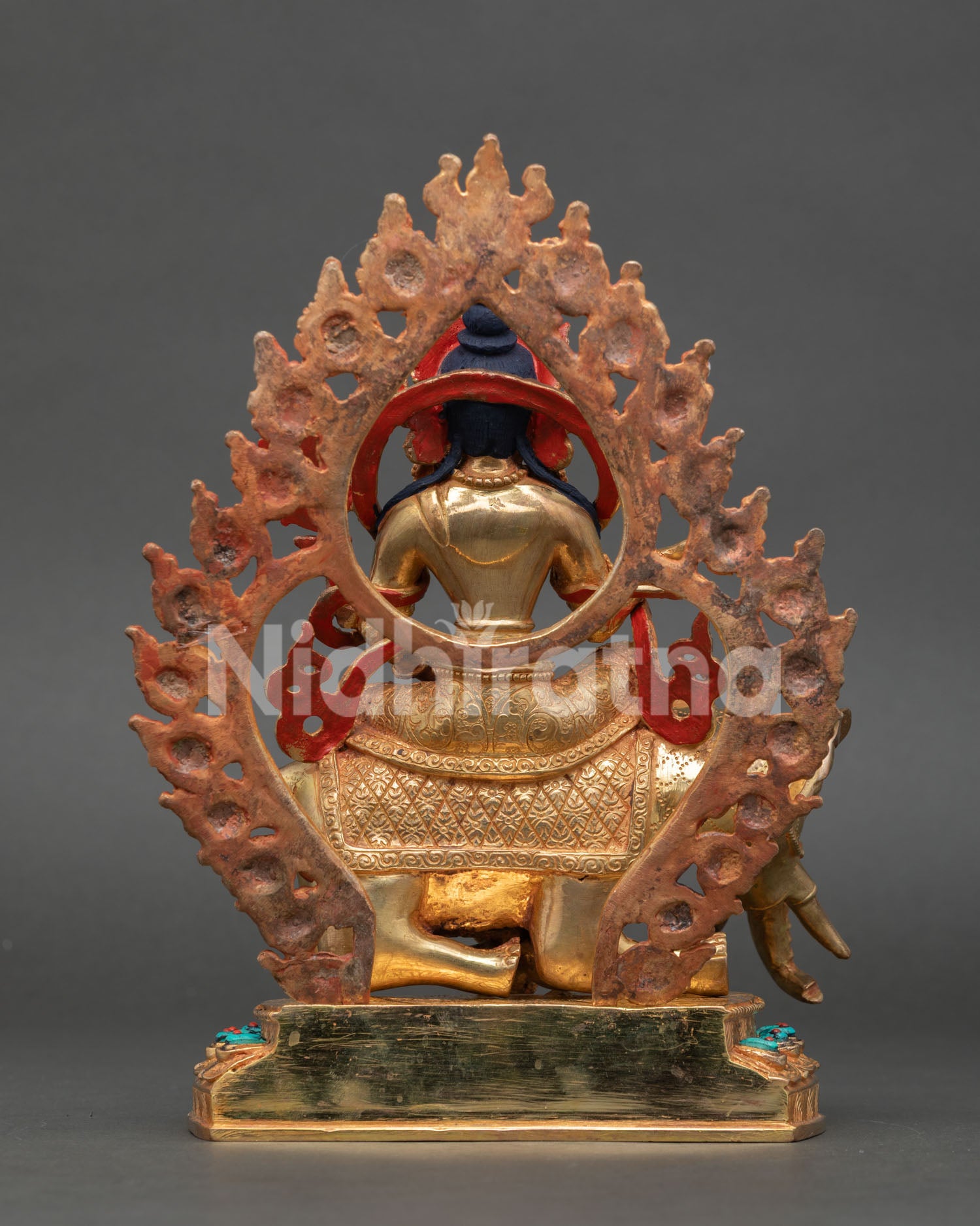 Back view of Samantabhadra statue with ornate halo and detailed Tibetan carvings