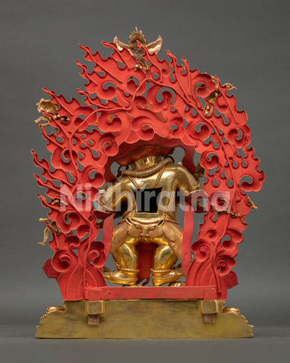 Back view of Shakya Mahakala statue displaying detailed halo, ornaments, and lotus base craftsmanship