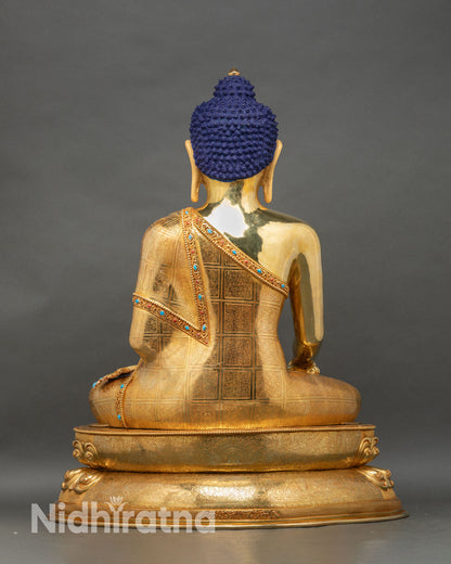 Back view of Shakyamuni Buddha statue, decorated lotus throne and traditional Newari craftsmanship