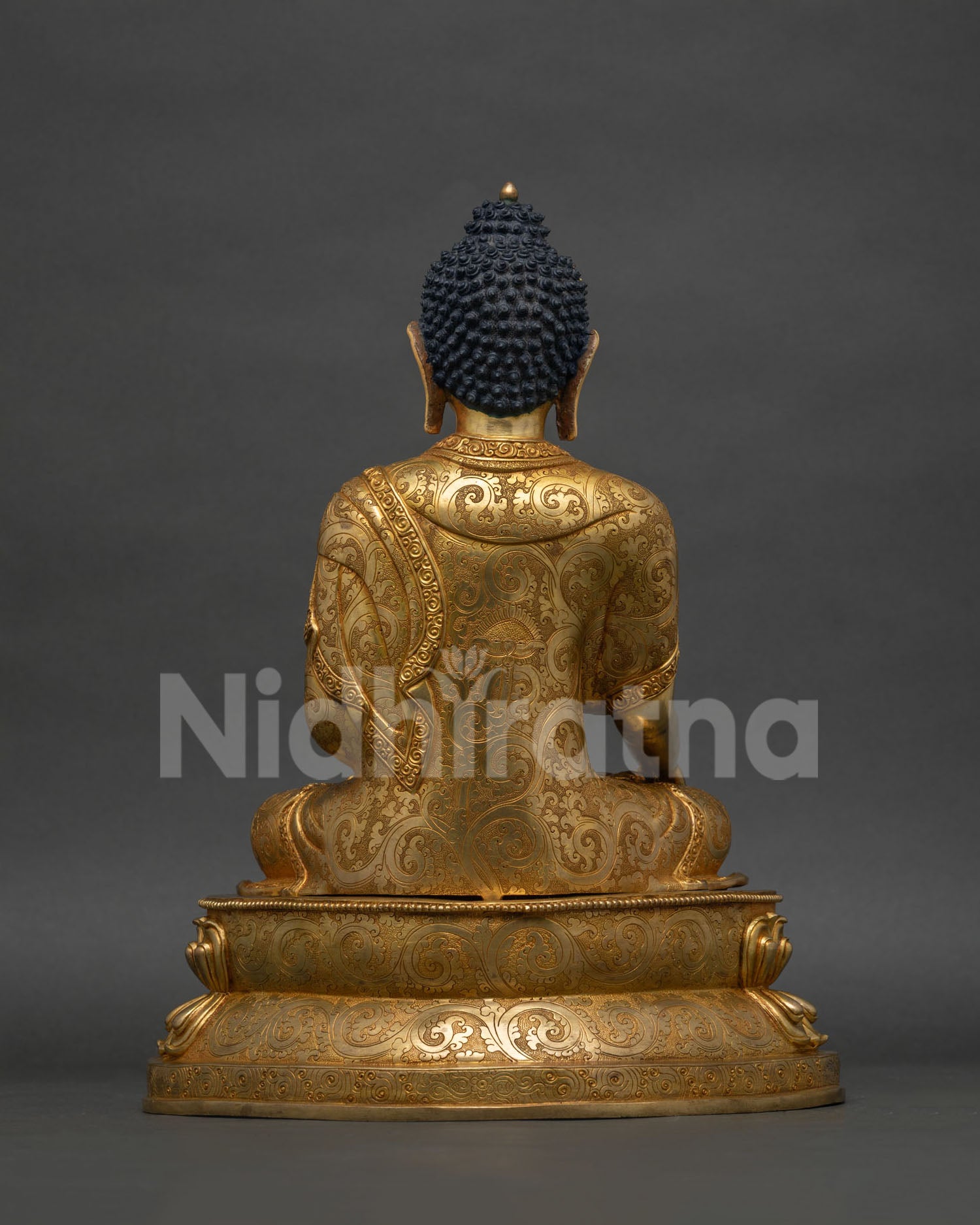Back view of Shakyamuni Buddha statue, gold-gilded copper sculpture from Nepal