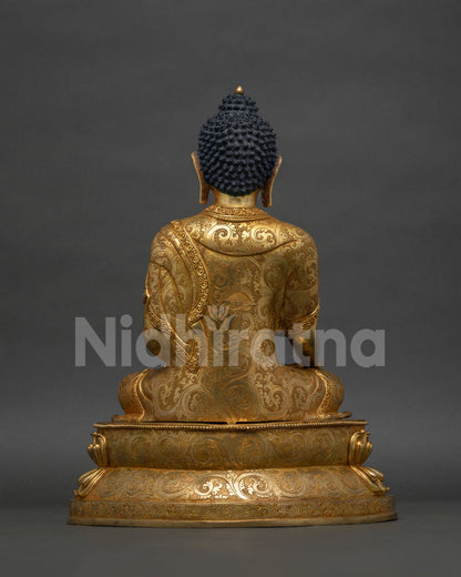Back view of Shakyamuni Buddha statue, gold-gilded copper sculpture from Nepal
