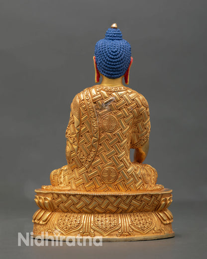 Back view of Shakyamuni Buddha statue handcrafted Nepal Newari craftsmanship lotus base detail copper metalwork spiritual Buddhist decor