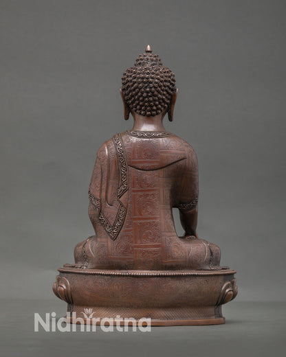 Back view of Shakyamuni Buddha statue highlighting intricate lotus throne carvings and authentic Nepalese lost wax metal casting artistry