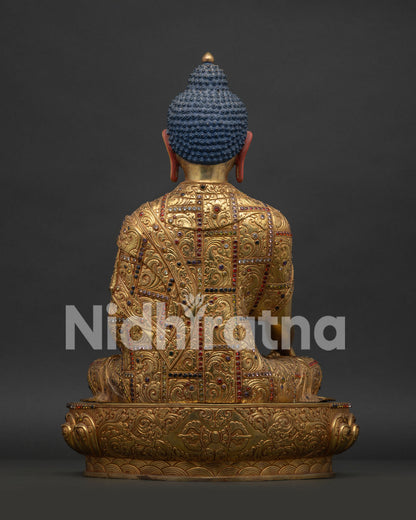 Back view of Shakyamuni Buddha Statue showcasing detailed robe carvings and copper craftsmanship