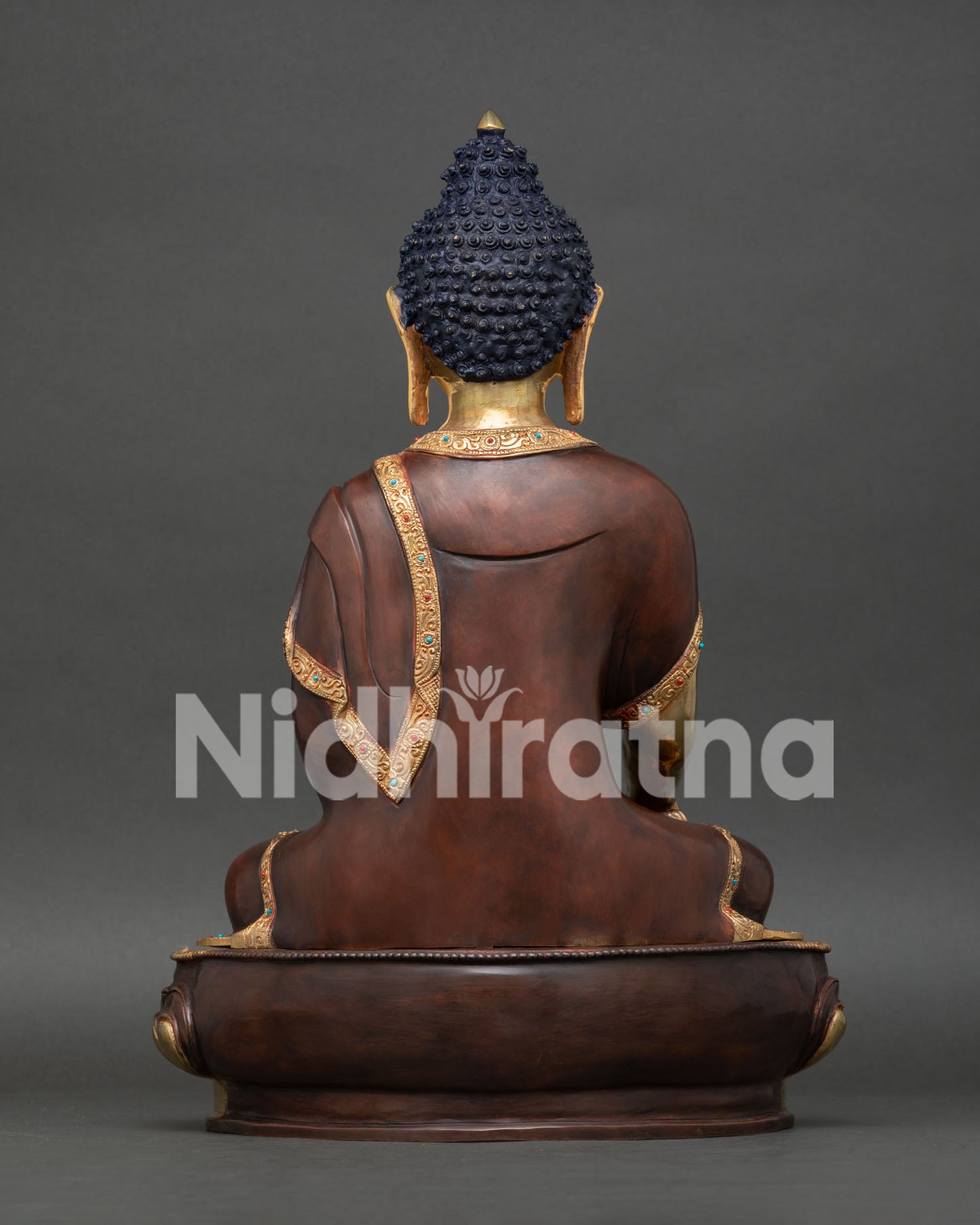 Back View of Shakyamuni Buddha Statue Showcasing Oxidized Robe and Gold Gilded Lotus Seat.