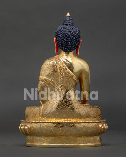 Back view of Shakyamuni Buddha Statue with intricate monastic robe carving and Himalayan craftsmanship