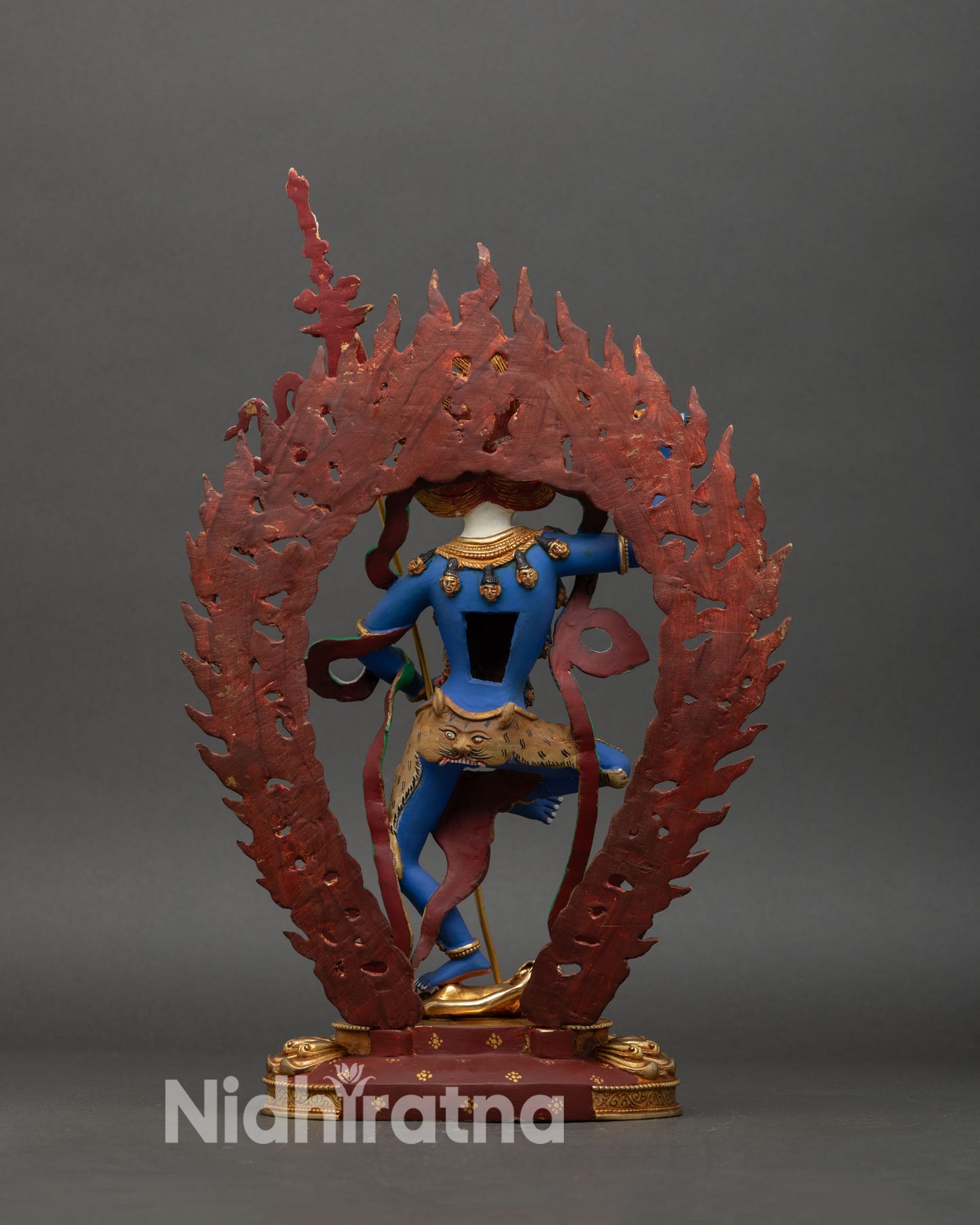 Back view of Simhamukha Statue, showing gold-gilded ornaments and intricate craftsmanship