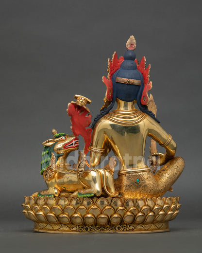Back view of Simhanada Manjushree statue handcrafted in copper with triple gold fire gilding finish showing detailed ornament work and Himalayan Buddhist sculpture design.