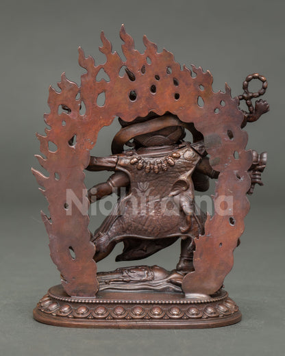 Back view of Six Armed Mahakala statue with halo of wisdom 